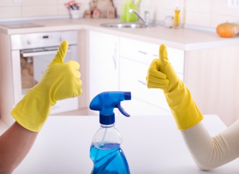After builders cleaning in a newly renovated home with dust removal tools