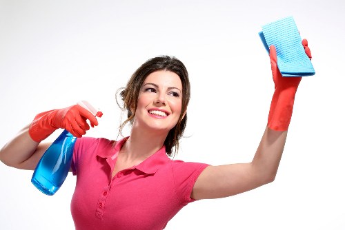 Detailed deep cleaning of kitchen and bathroom surfaces